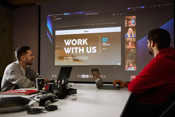 Team workshop discussing employer branding and career page strategy