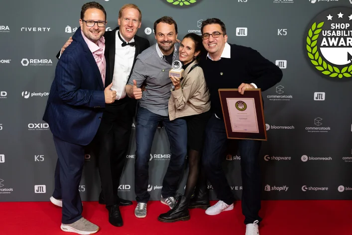 Creativestyle team at the Shop Usability Award gala celebrating the win with Betzold