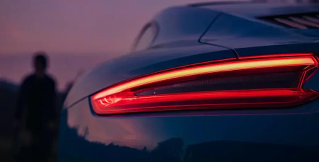 Car rear light close-up in motion