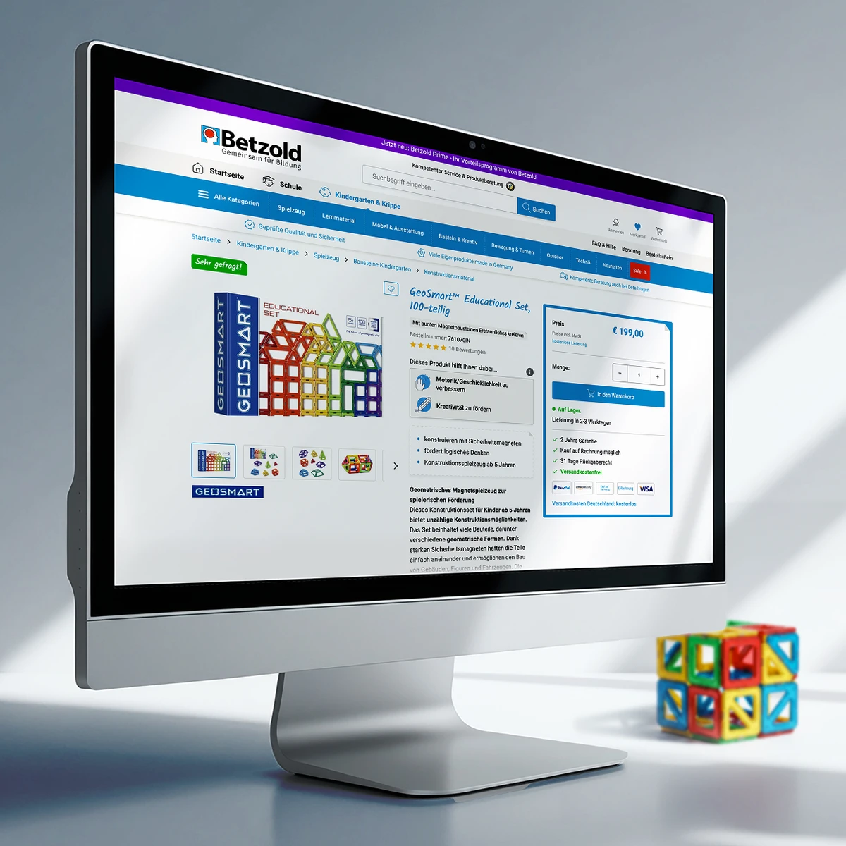 Betzold e-commerce website preview on a desktop monitor showcasing the "GeoSmart Educational Set" product page with detailed pricing, magnetic building block features, and technical specifications