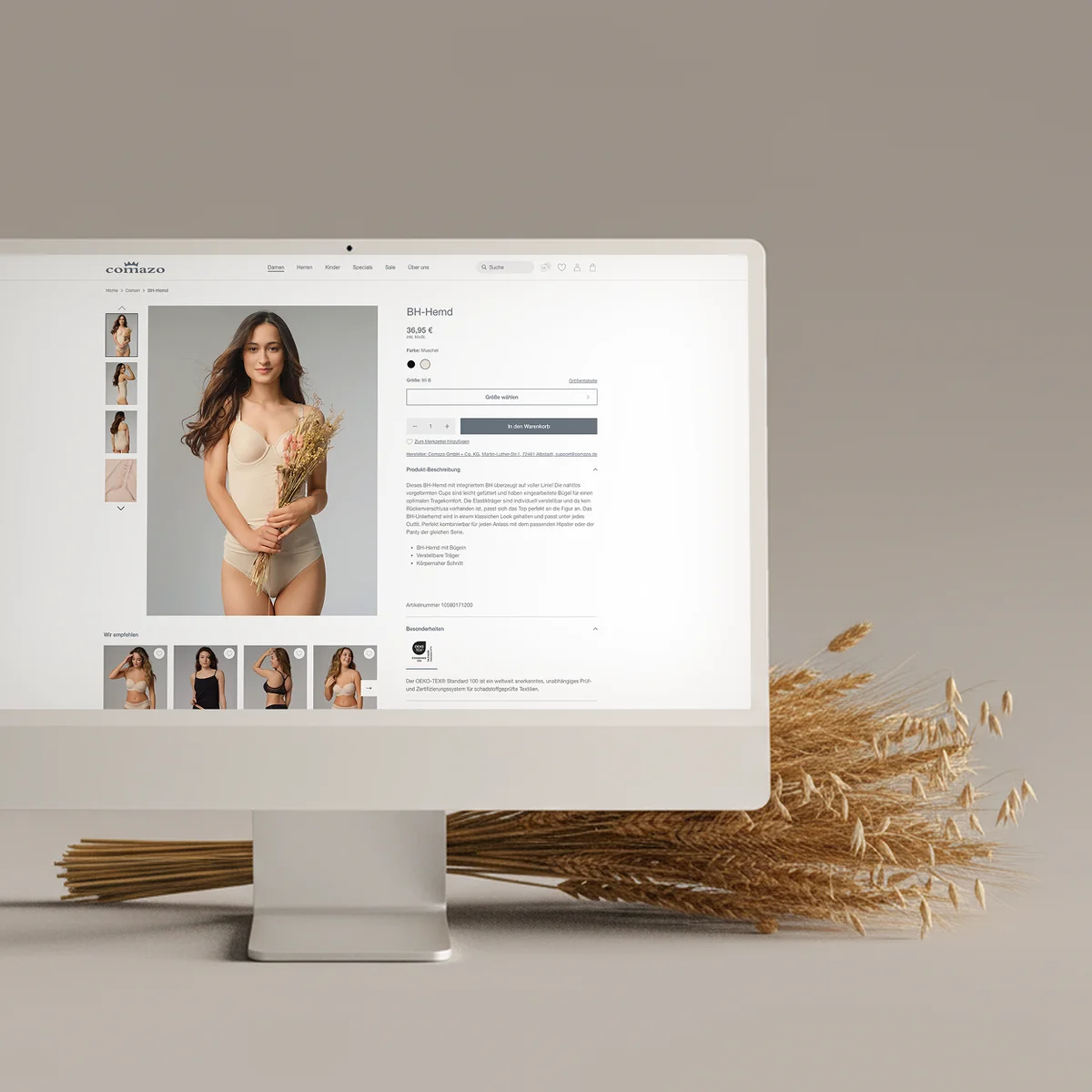 Comazo e-commerce website preview on a desktop monitor showcasing the "BH-Hemd" product page with detailed pricing, color selection, and product descriptions alongside decorative dried wheat
