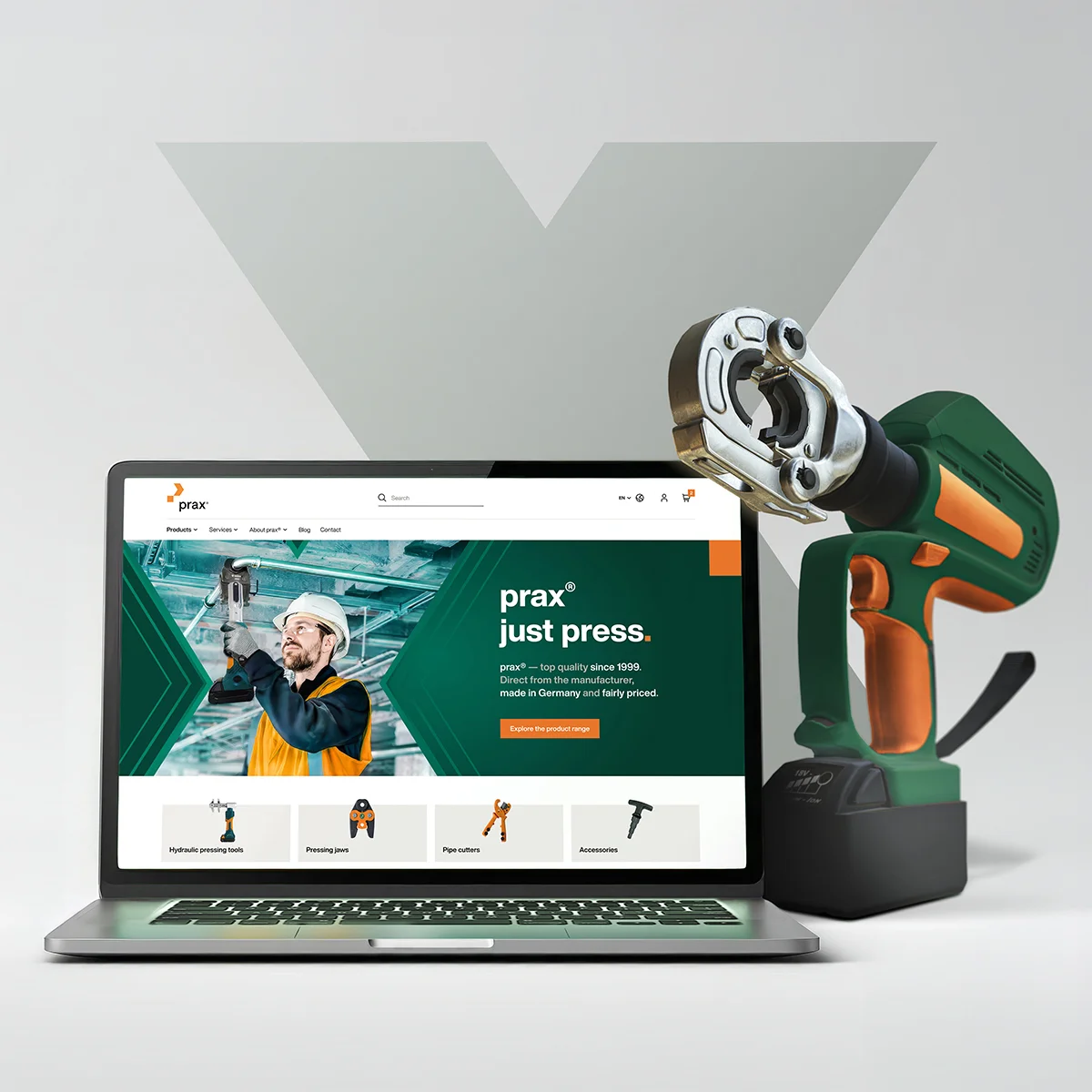 Prax-Tools e-commerce website on a laptop showcasing industrial tools and brand quality next to a physical pressing tool