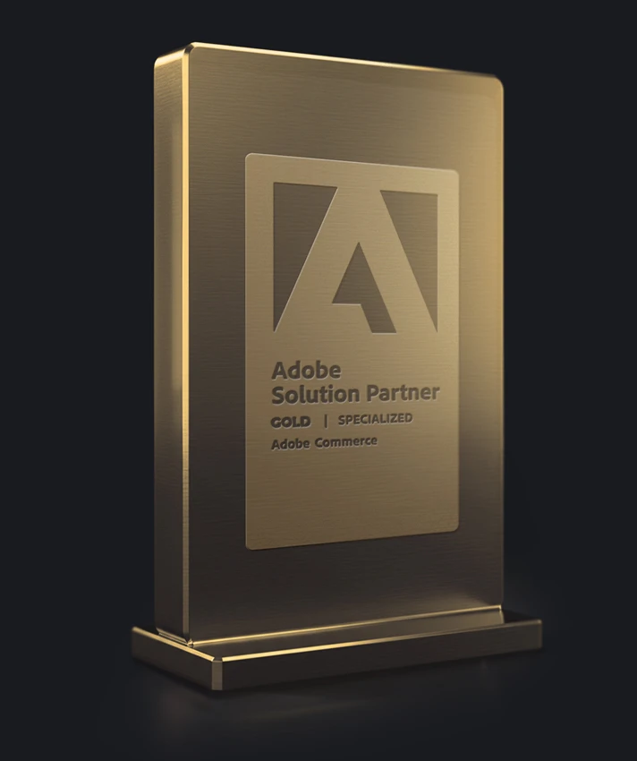 Adobe Solution Partner Gold award trophy for Adobe Commerce on a dark background