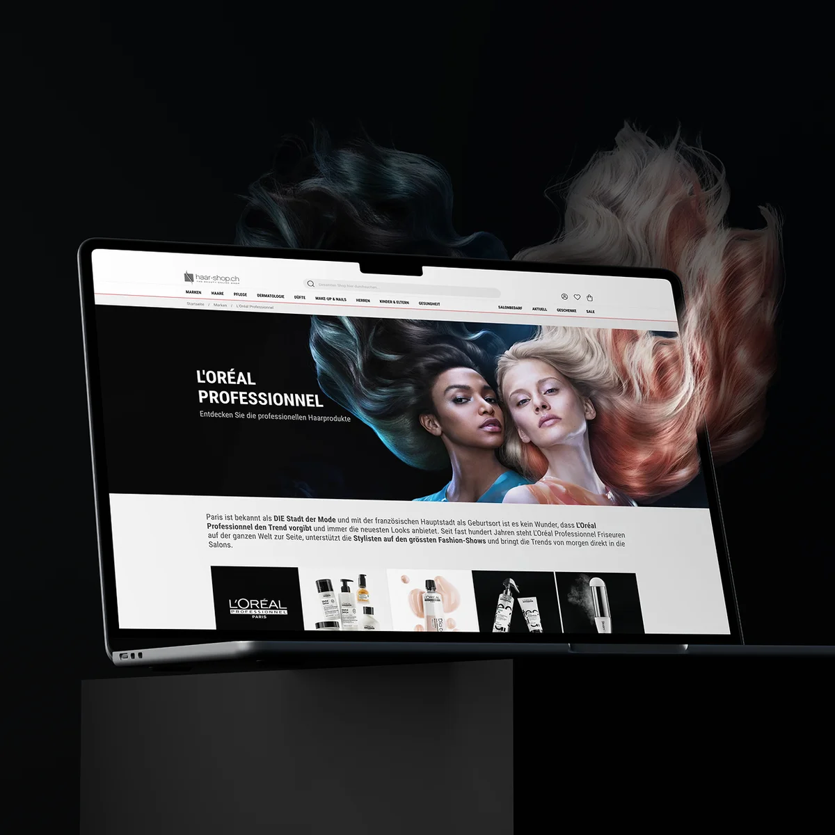 haar-shop.ch e-commerce website preview on a laptop showcasing the "L'ORÉAL PROFESSIONNEL" brand page with a dramatic visual of models and flowing colorful hair, set against a dark background with artistic hair extensions