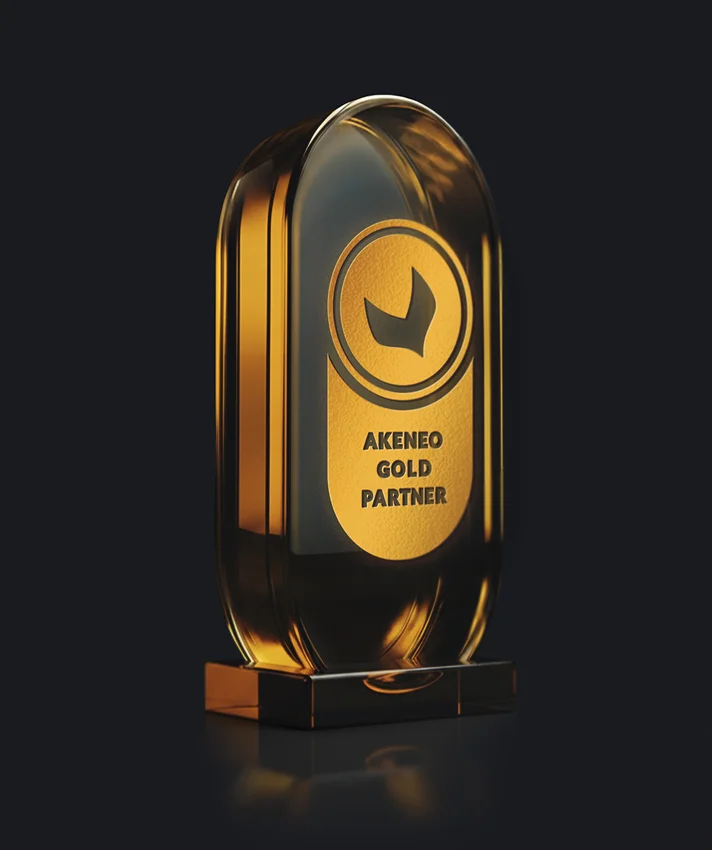 Akeneo Gold Partner award trophy on a dark background