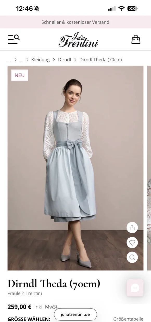 Product detail page of a woman in a light blue dirndl with a white lace blouse by Julia Trentini
