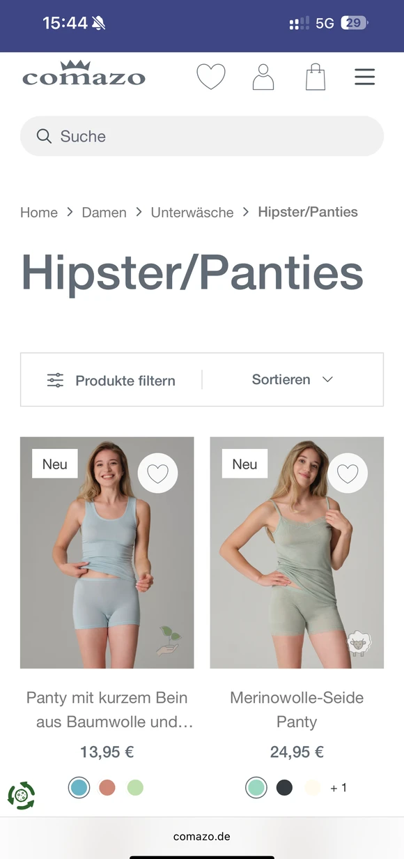 Comazo mobile e-commerce interface displaying a product listing for women's underwear, featuring "Panty mit kurzem Bein" (Short-leg panties) and "Merinowolle-Seide Panty" (Merino wool-silk panties) with pricing and color options