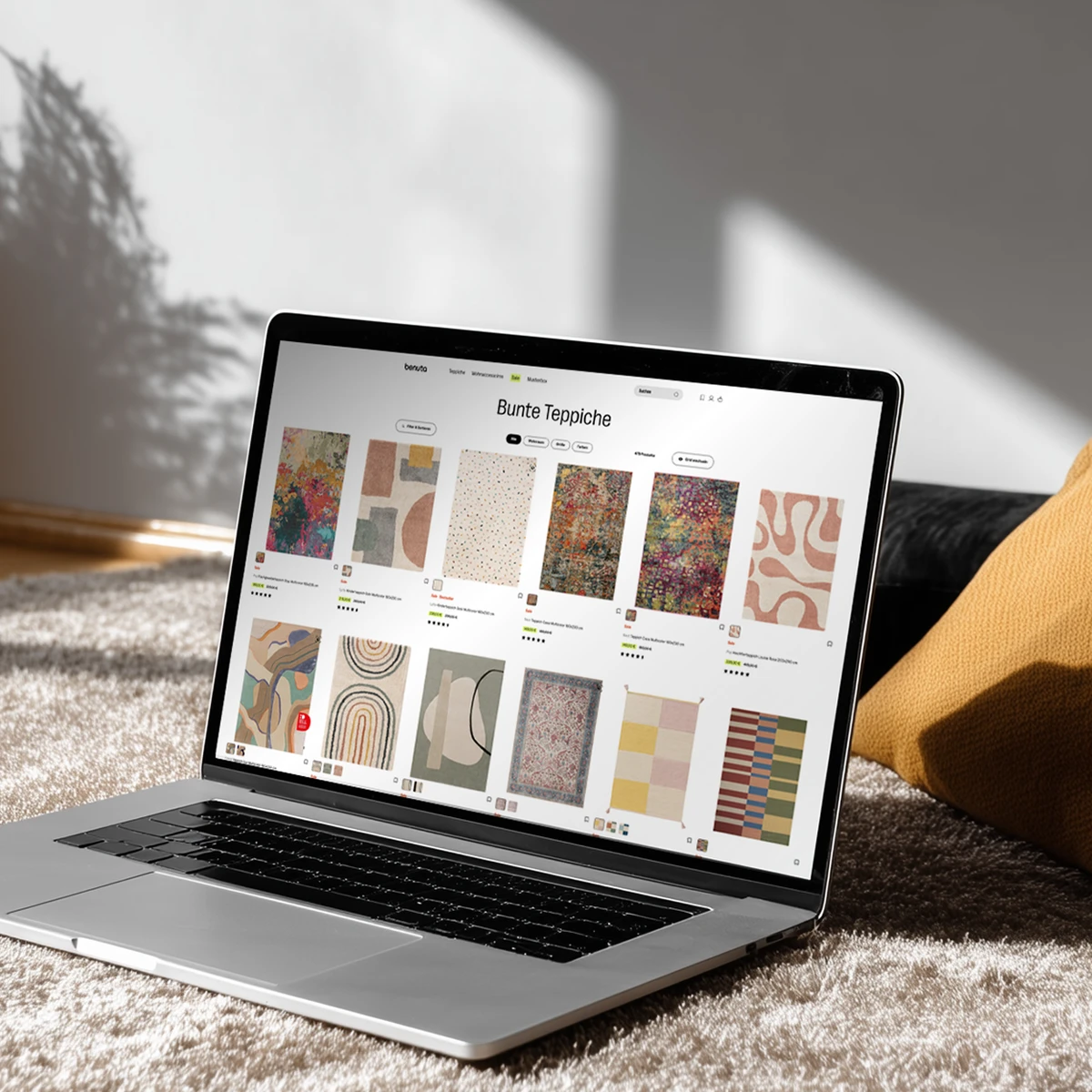 Benuta e-commerce website preview on laptop showcasing colorful rug collection in a modern living room setting