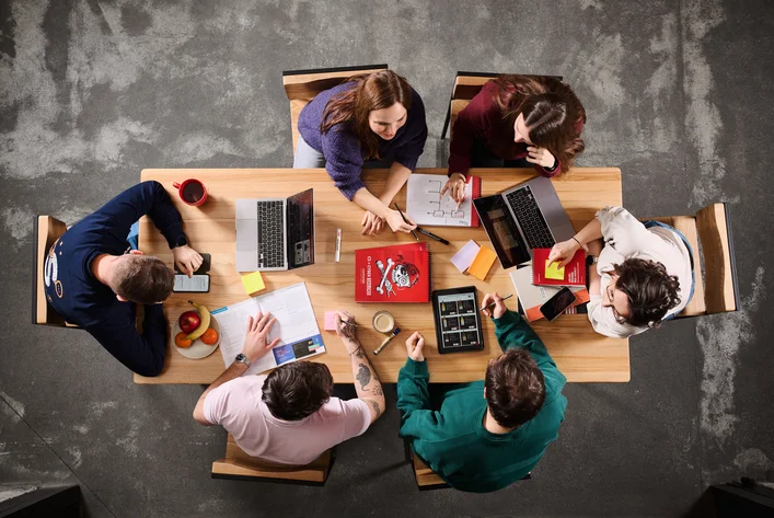 Team meeting discussing growth strategies